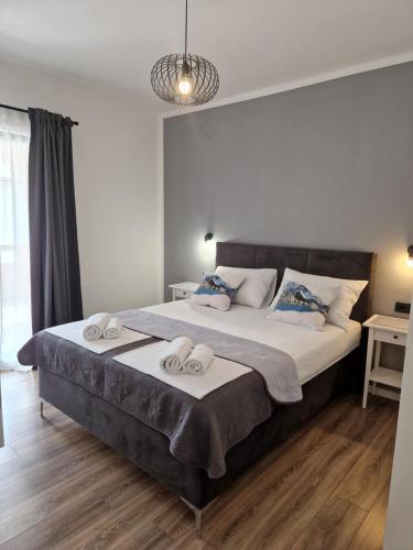 Postel nebo postele na pokoji v ubytování Apartments Jadranka