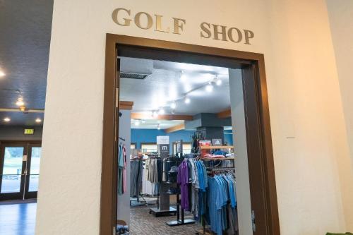a store door with a golf shop sign on it at Mount Shasta Resort in Mount Shasta