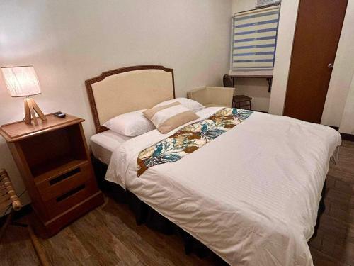 En eller flere senge i et værelse på Ciudad Fernandino Hotel