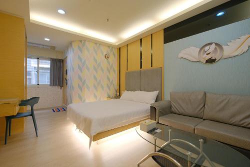 Ένα ή περισσότερα κρεβάτια σε δωμάτιο στο 85 Asia Hotel