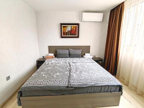 Кровать или кровати в номере Venice Apartments