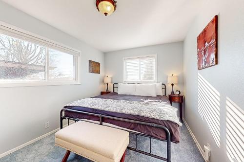a bedroom with a bed and a window at Hog Heaven in Fayetteville
