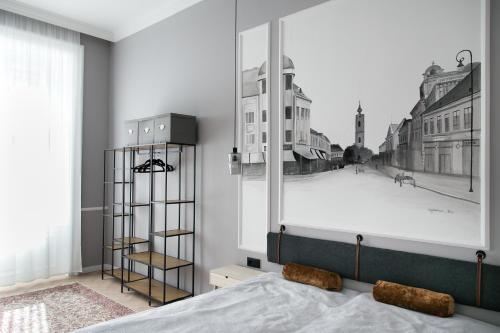 Postel nebo postele na pokoji v ubytování Schreyer Apartman