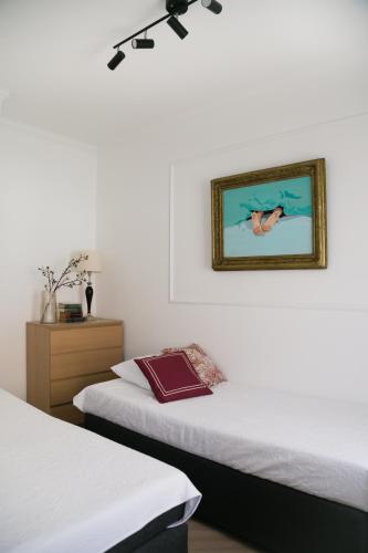 Postel nebo postele na pokoji v ubytování Schreyer Apartman