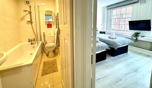 Ванна кімната в The G Spot - 1 Bedroom Apartment Edgware Road Central London