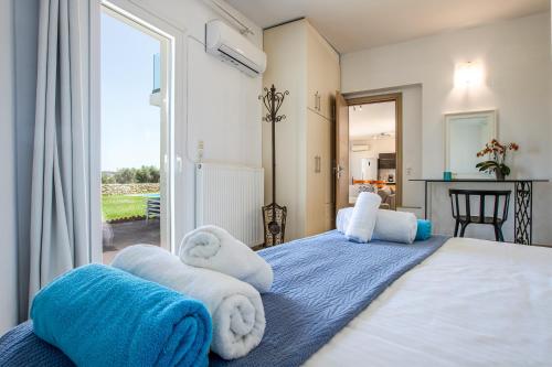 Postel nebo postele na pokoji v ubytování Villa PENELOPE