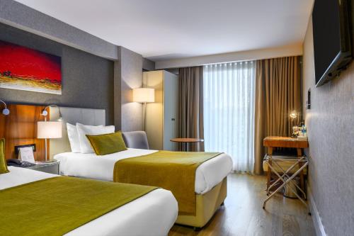 Ramada by Wyndham Istanbul Grand Bazaarにあるテレビまたはエンターテインメントセンター