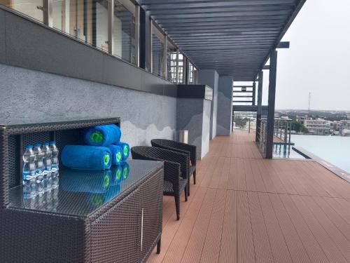 a building with bottles of water on a balcony at Fortune Park, Tiruppur - Member ITC Hotels' Group in Tiruppūr