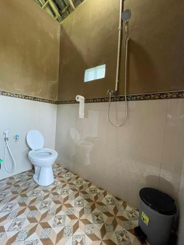 Ένα μπάνιο στο Manada Villa Homestay