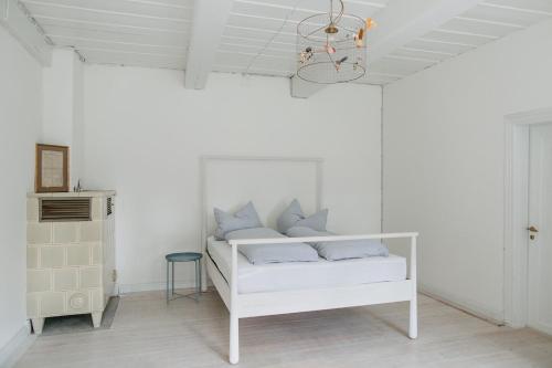 Ένα ή περισσότερα κρεβάτια σε δωμάτιο στο NordseeEstate - Lodge unter Reet mit Sauna