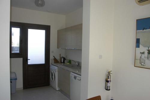 Η κουζίνα ή μικρή κουζίνα στο Summer Breeze