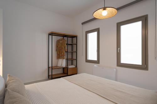Postel nebo postele na pokoji v ubytování Rizes Villas Santorini with private pool