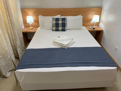 Cama ou camas em um quarto em Deluxe Aparthotel