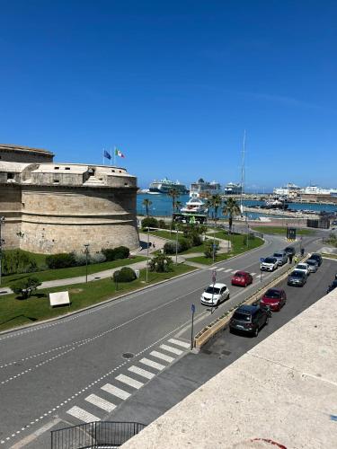 a street with cars parked on the side of a road at Casa Leandra in Civitavecchia