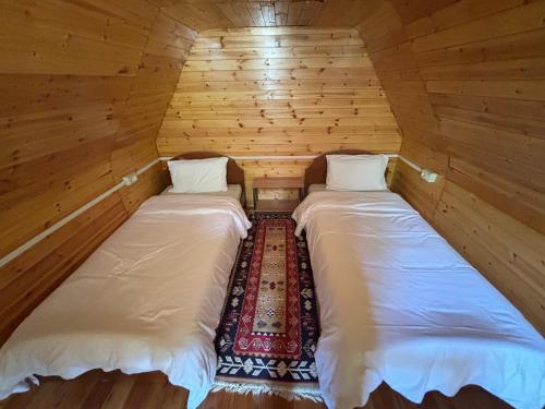Cama ou camas em um quarto em Magic Space Petros Skafias