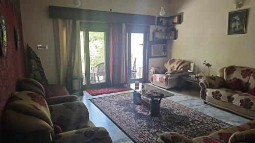 Posezení v ubytování Sweet Home 8 Chandigarh