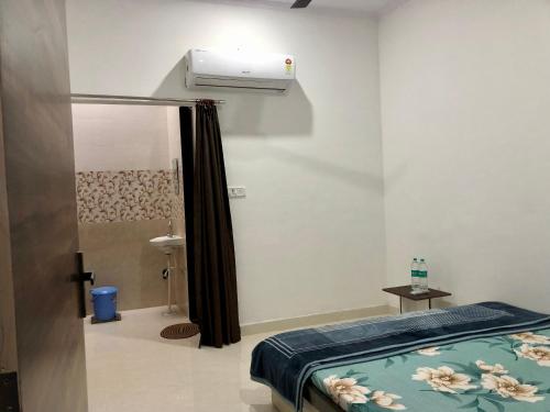 Ванна кімната в BHAI BHAI GUEST HOUSE