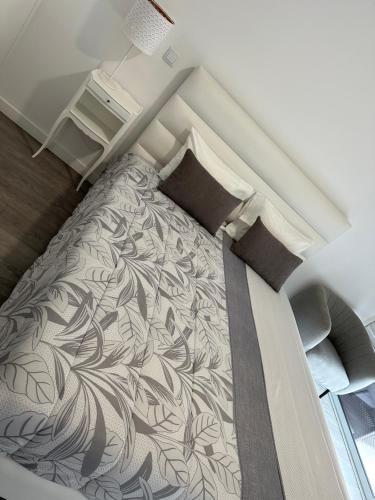Ένα ή περισσότερα κρεβάτια σε δωμάτιο στο PMDOUROVALLEY