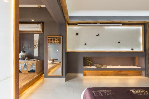 Fotografie z fotogalerie ubytování 重庆解放碑阳崽民宿高层新中式景观Youngzai Apt in Jiefangbei 5 v destinaci Čchung-čching