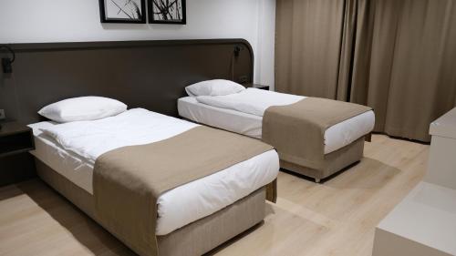 En eller flere senge i et værelse på PARK DEMİRKAPI HOTEL
