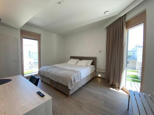 Postel nebo postele na pokoji v ubytování Hotel Plein Air Residence & Resort