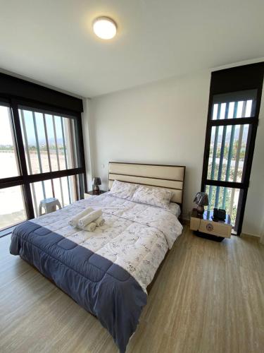 Ένα ή περισσότερα κρεβάτια σε δωμάτιο στο Ayla apartment