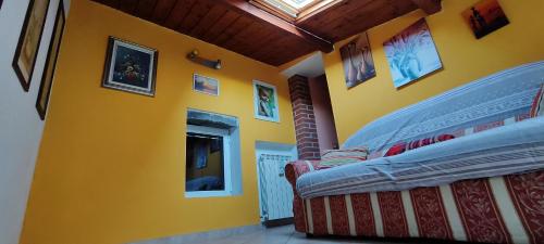 Кровать или кровати в номере Casa vacanze belvedere
