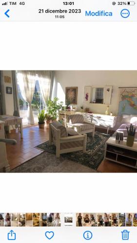 a living room with couches and tables in it at B & B Da Giusy in Corte Franca