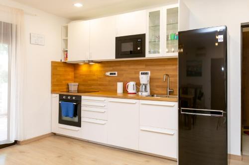 Η κουζίνα ή μικρή κουζίνα στο Isabella