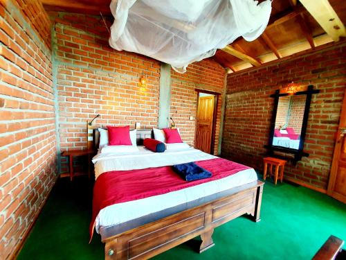 Postel nebo postele na pokoji v ubytování Sunbeam Homestay