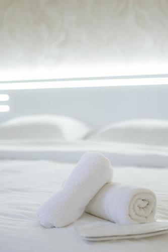 a roll of toilet paper sitting on a table at Mashtots Avenue Hotel in Yerevan
