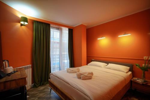 Postel nebo postele na pokoji v ubytování Station 22 Hotel