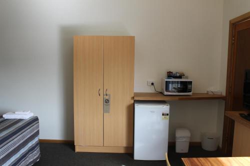 Kuchyň nebo kuchyňský kout v ubytování Mountain View Motel