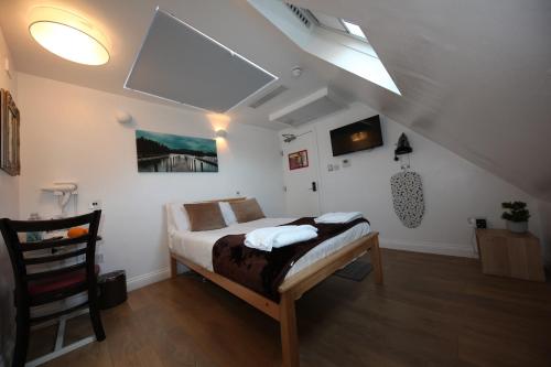Postel nebo postele na pokoji v ubytování City London Hotel