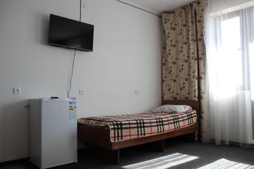 Una cama o camas en una habitación de Wings Art