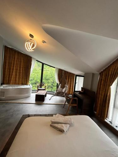 Katil atau katil-katil dalam bilik di Macartaşı Hotel