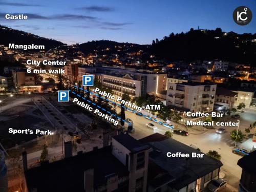 an overhead view of a city at night at KC Apartment 1 in Berat