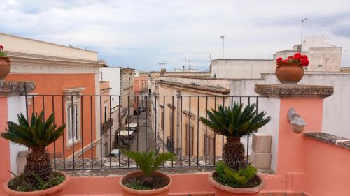 Un balcón o terraza en La casa di via Lata