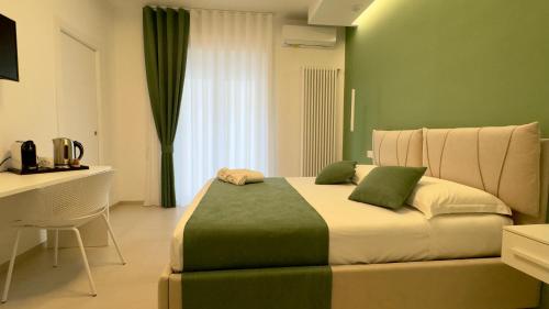 Postel nebo postele na pokoji v ubytování Le Stagioni Rooms
