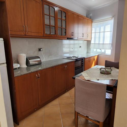 Virtuvė arba virtuvėlė apgyvendinimo įstaigoje SunSea apartment