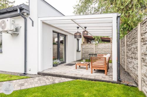 Κήπος έξω από το Apartamenty studio Parkowa 17 Darłówko - Przy plaży