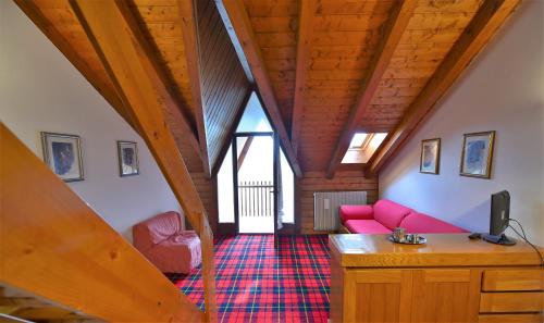 Posezení v ubytování Residence Des Alpes
