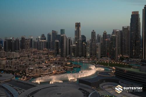 a view of a city with a bunch of tall buildings at Fashion avenue Dubai Mall -The Residence in Dubai