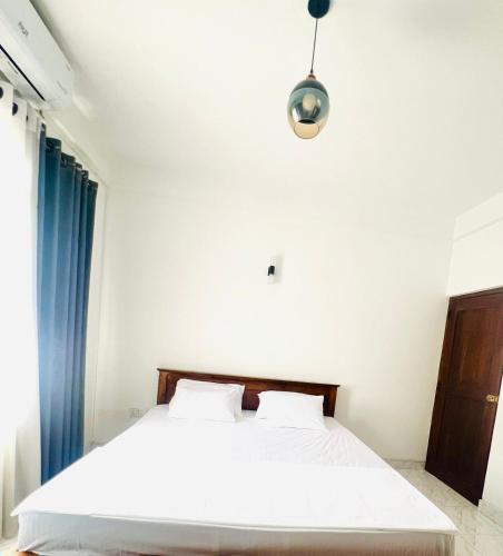 Ein Bett oder Betten in einem Zimmer der Unterkunft Rockview Gardens Homestay