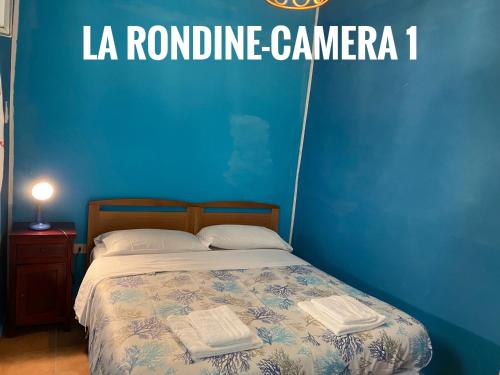 Posteľ alebo postele v izbe v ubytovaní Ponzamania La terrazza di Cala Feola