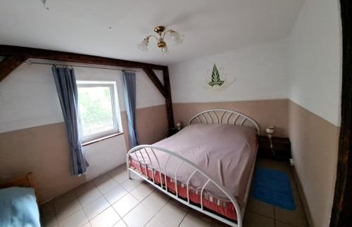 Postel nebo postele na pokoji v ubytování Śródziemie Lorien