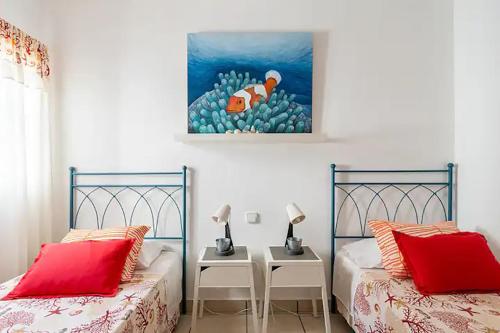 Posteľ alebo postele v izbe v ubytovaní Casita de la Playa