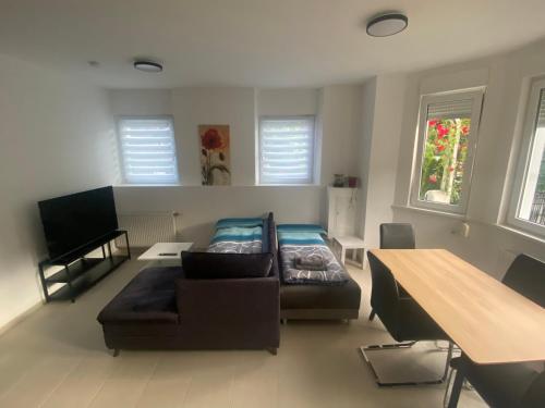 TV a/nebo společenská místnost v ubytování Mia Apartment
