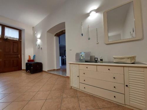 Kuchyň nebo kuchyňský kout v ubytování B&B Cala Seggiola