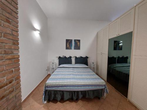Postel nebo postele na pokoji v ubytování B&B Cala Seggiola